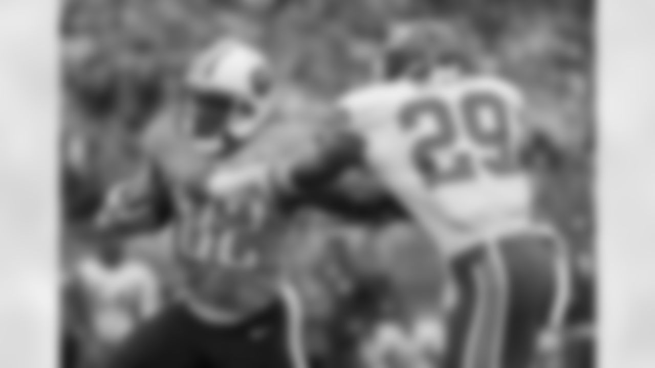 Tennessee Titans tight end Delanie Walker (82) is stopped by Kansas City Chiefs safety Eric Berry (29) after a 15-yard gain in the second quarter of an NFL football game on Sunday, Oct. 6, 2013, in Nashville, Tenn. (AP Photo/Wade Payne)