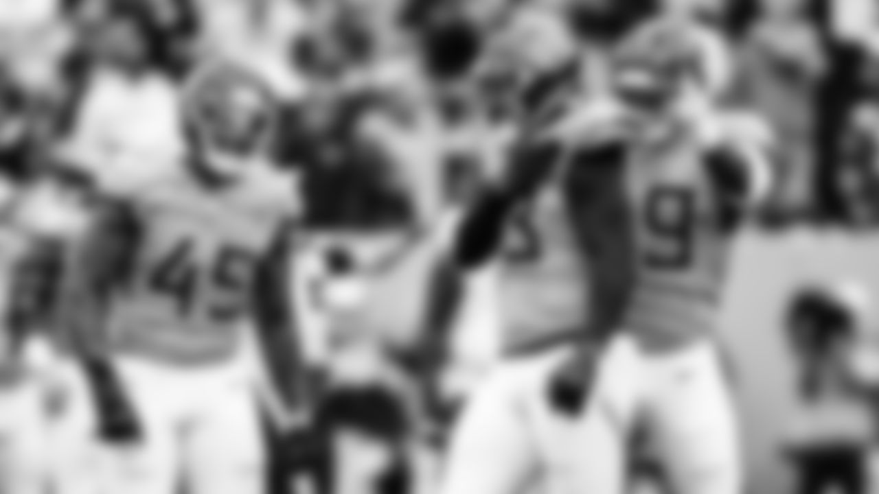 Outside linebacker Dre'Mont Jones #45 of the Tennessee Titans, Outside linebacker Jihad Ward #53 of the Tennessee Titans and Outside linebacker Ali Gaye #99 of the Tennessee Titans during the game between the Tennessee Titans and the New England Patriots at Nissan Stadium on October 19, 2025 in Nashville, TN. Photo By Tennessee Titans