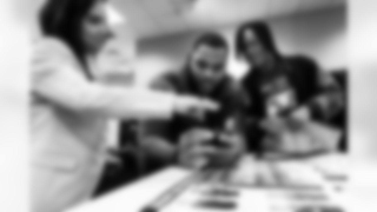 Defensive tackle Jeffery Simmons #98 of the Tennessee Titans hosts 5 high school seniors to get fitted for suits at Men's Warehouse on December 17, 2024 in Franklin, TN. Photo By Jessie Rogers/Tennessee Titans