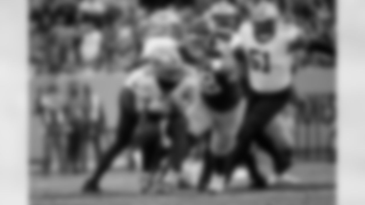 New Orleans Saints quarterback Trevor Siemian (15) is sacked by Tennessee Titans defensive tackle Jeffery Simmons (98) in the first half of an NFL football game Sunday, Nov. 14, 2021, in Nashville, Tenn. (AP Photo/John Amis)