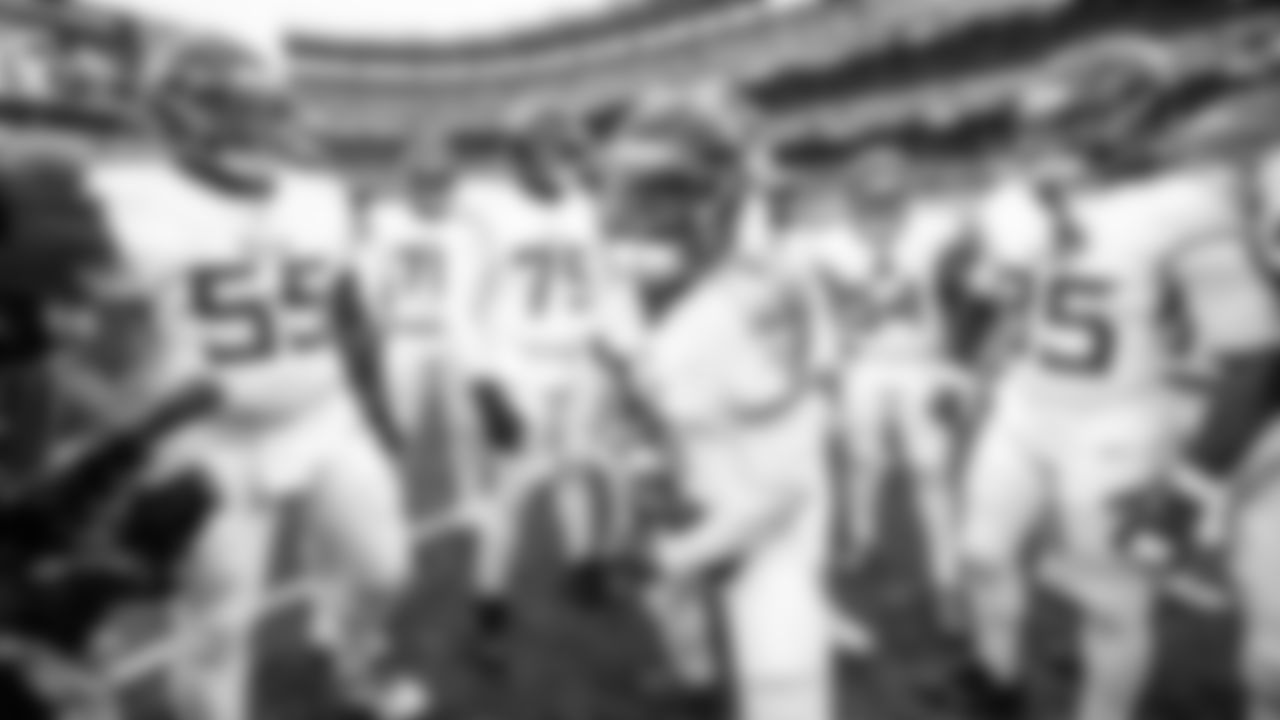 Quarterback Cam Ward #1 of the Tennessee Titans, Tight end Chig Okonkwo #85 of the Tennessee Titans, and Tackle JC Latham #55 of the Tennessee Titans before the game between the Tennessee Titans and the Cleveland Browns at Huntington Bank Field on December 07, 2025 in Cleveland, OH. Photo By Donald Page/Tennessee Titans