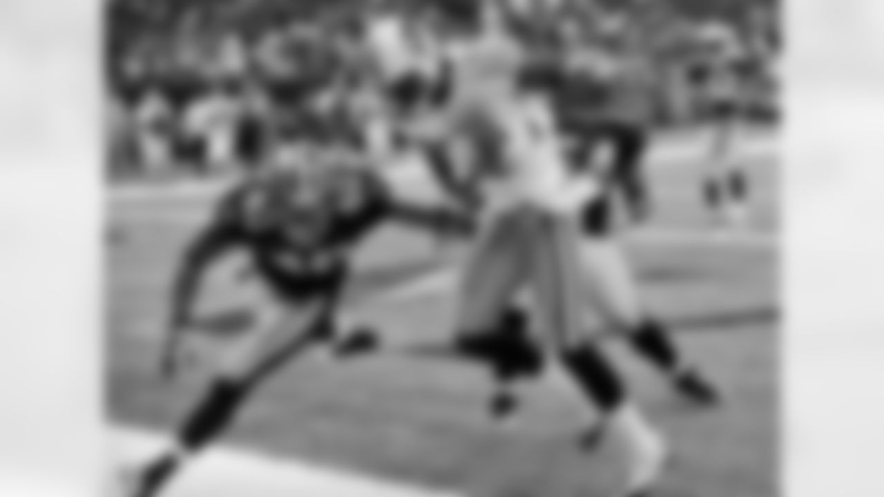 Tennessee Titans wide receiver Michael Preston (14) and New Orleans Saints defensive back Jonathon Amaya (40) during an NFL preseason football game at the Louisiana Superdome in New Orleans, Thursday, Sept. 1, 2011. (AP Photo/Bill Feig)