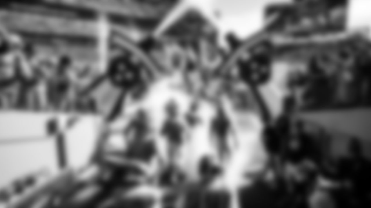 The Tennessee Titans run onto the field during pregame introductions before the game between the Tennessee Titans and the Kansas City Chiefs at Nissan Stadium on December 21, 2025 in Nashville, TN. Photo By Camden Hall/Tennessee Titans