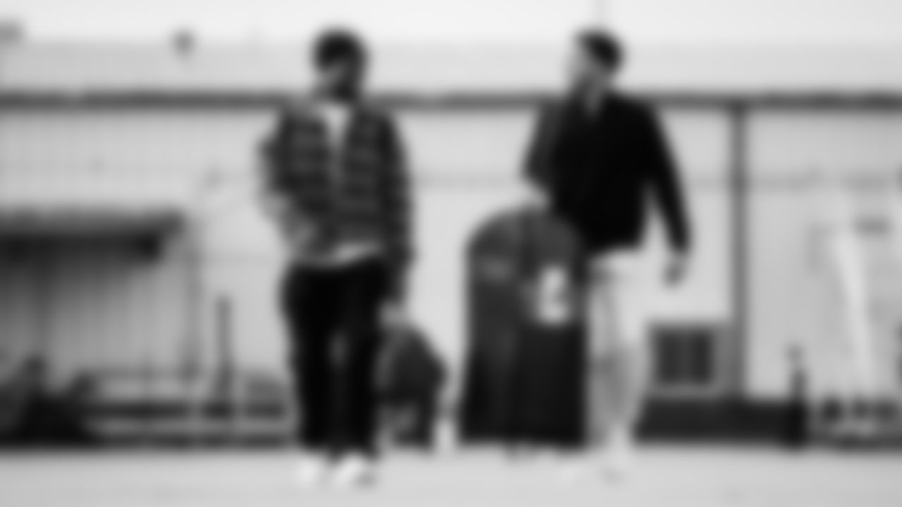 Running back Kalel Mullings #31 of the Tennessee Titans and Wide receiver Chimere Dike #17 of the Tennessee Titans during the travel day at the Nashville International Airport on December 06, 2025 in Nashville, TN. Photo by Jessie Roger/Tennessee Titans