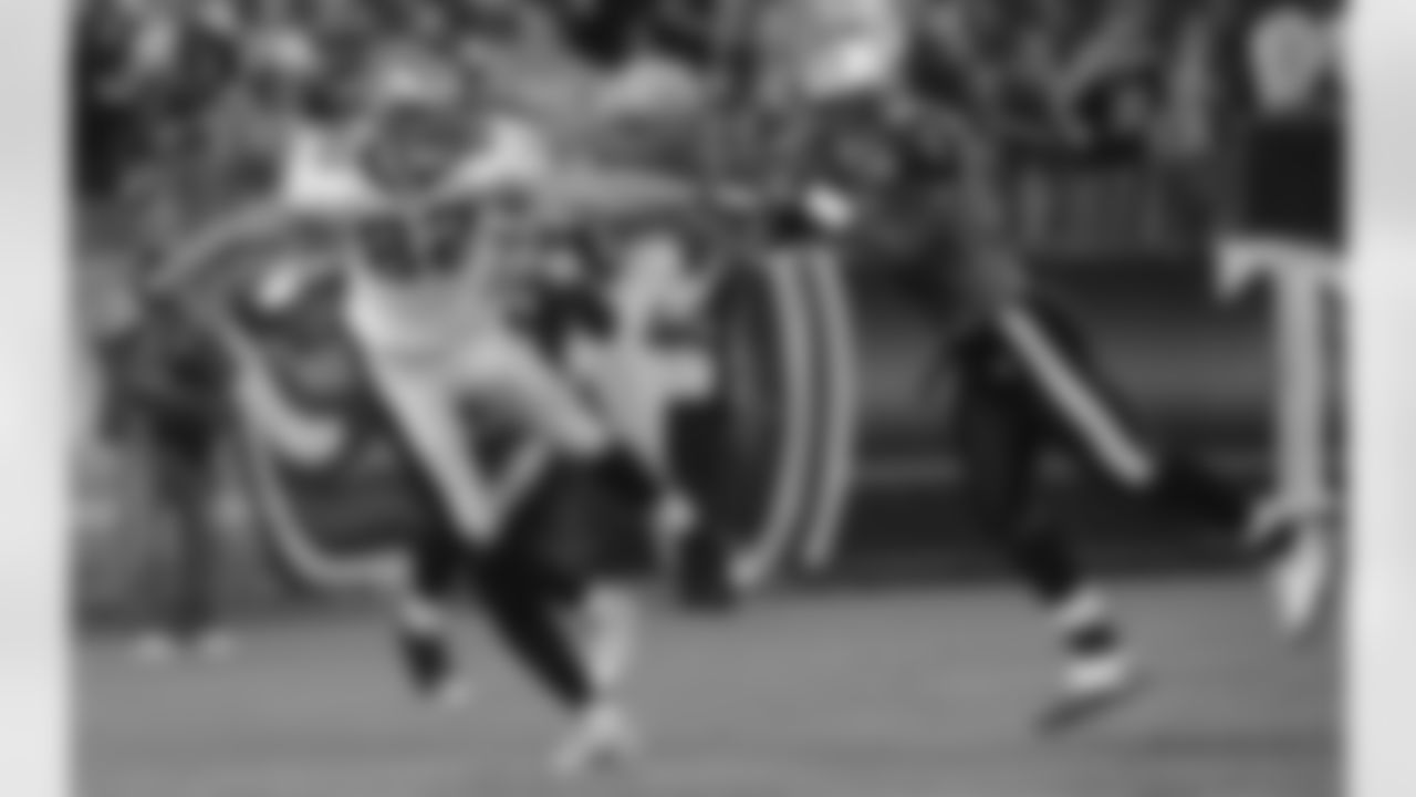 Tennessee Titans linebacker Gerald McGrath, right, grabs the ball late in the fourth quarter to end the final New Orleans Saints drive during the second half their NFL preseason football game against the New Orleans Saints at LP Field in Nashville, Tenn., Thursday, Sept. 2, 2010. Saints receiver Tyler Lorenzen, left, looks on. Tennessee won 27-24. (AP Photo/John Russell)