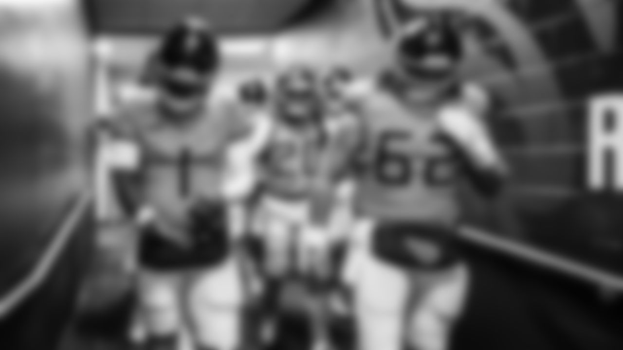 Quarterback Cam Ward #1 of the Tennessee Titans and Center/Guard Corey Levin #62 of the Tennessee Titans during the game between the Tennessee Titans and the Jacksonville Jaguars at Nissan Stadium on November 30, 2025 in Nashville, TN. Photo By Donald Page/Tennessee Titans