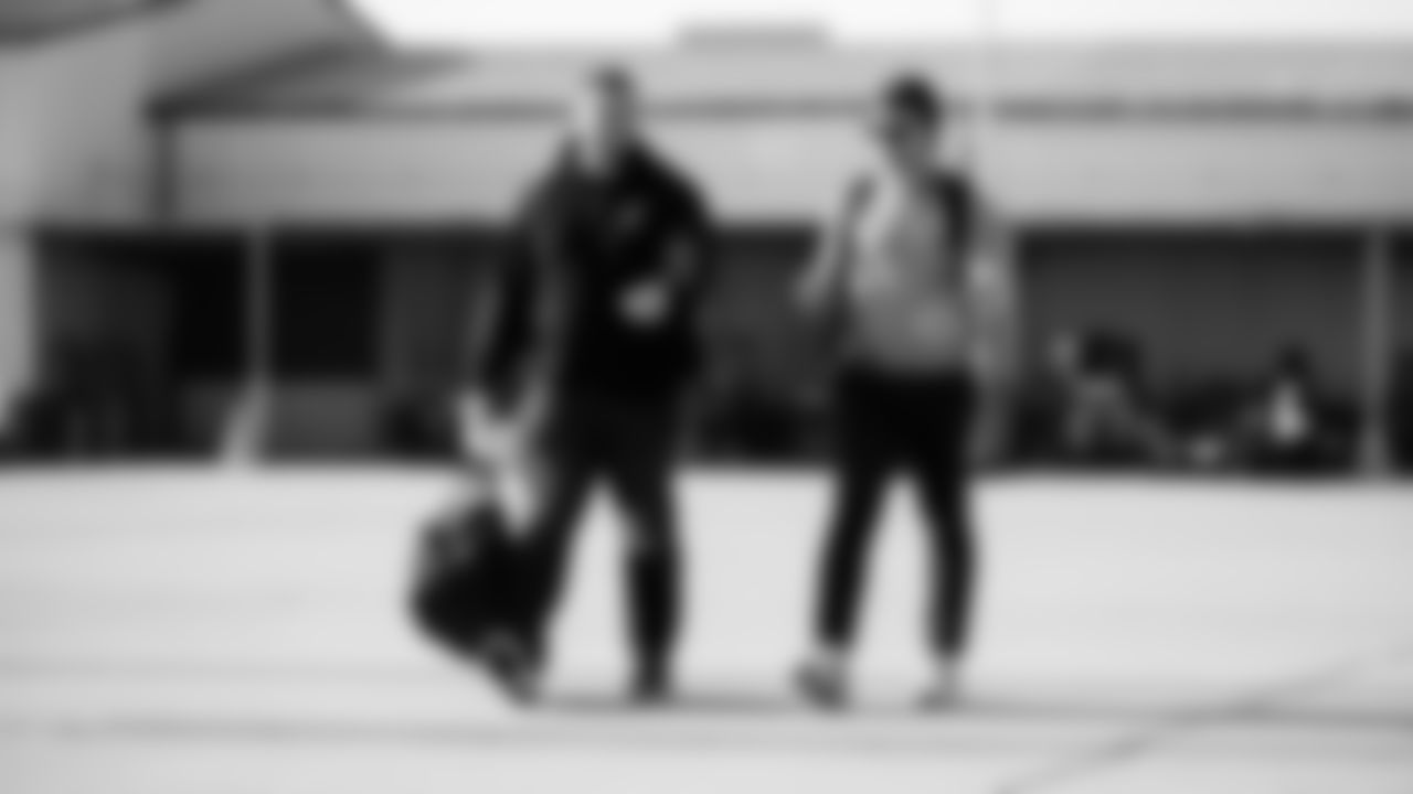 Offensive lineman Peter Skoronski #77 of the Tennessee Titans and Quarterback Trevor Siemian #15 of the Tennessee Titans during the travel day at the Nashville International Airport on January 03, 2026 in Nashville, TN. Photo by Jessie Rogers/Tennessee Titans