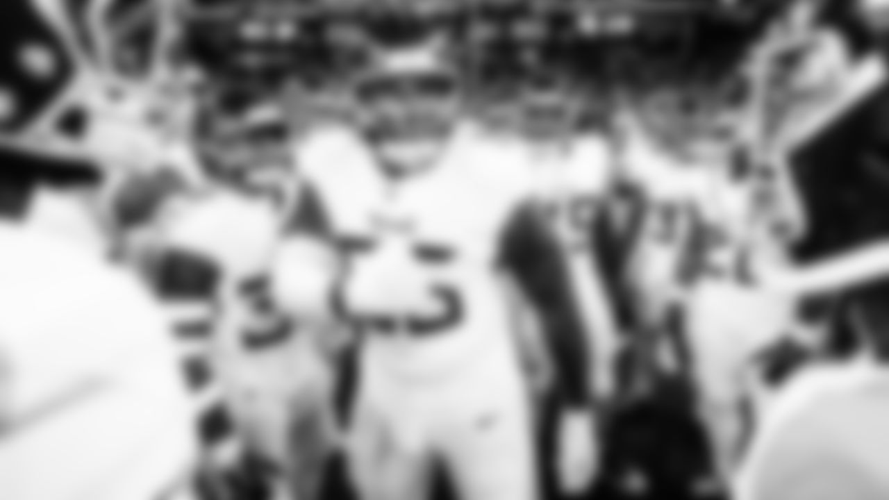 Defensive back Kendell Brooks #30 of the Tennessee Titans, Tackle JC Latham #55 of the Tennessee Titans before the game between the Tennessee Titans and the Indianapolis Colts at Lucas Oil Stadium on October 26, 2025 in Indianapolis, IN. Photo By Donald Page/Tennessee Titans