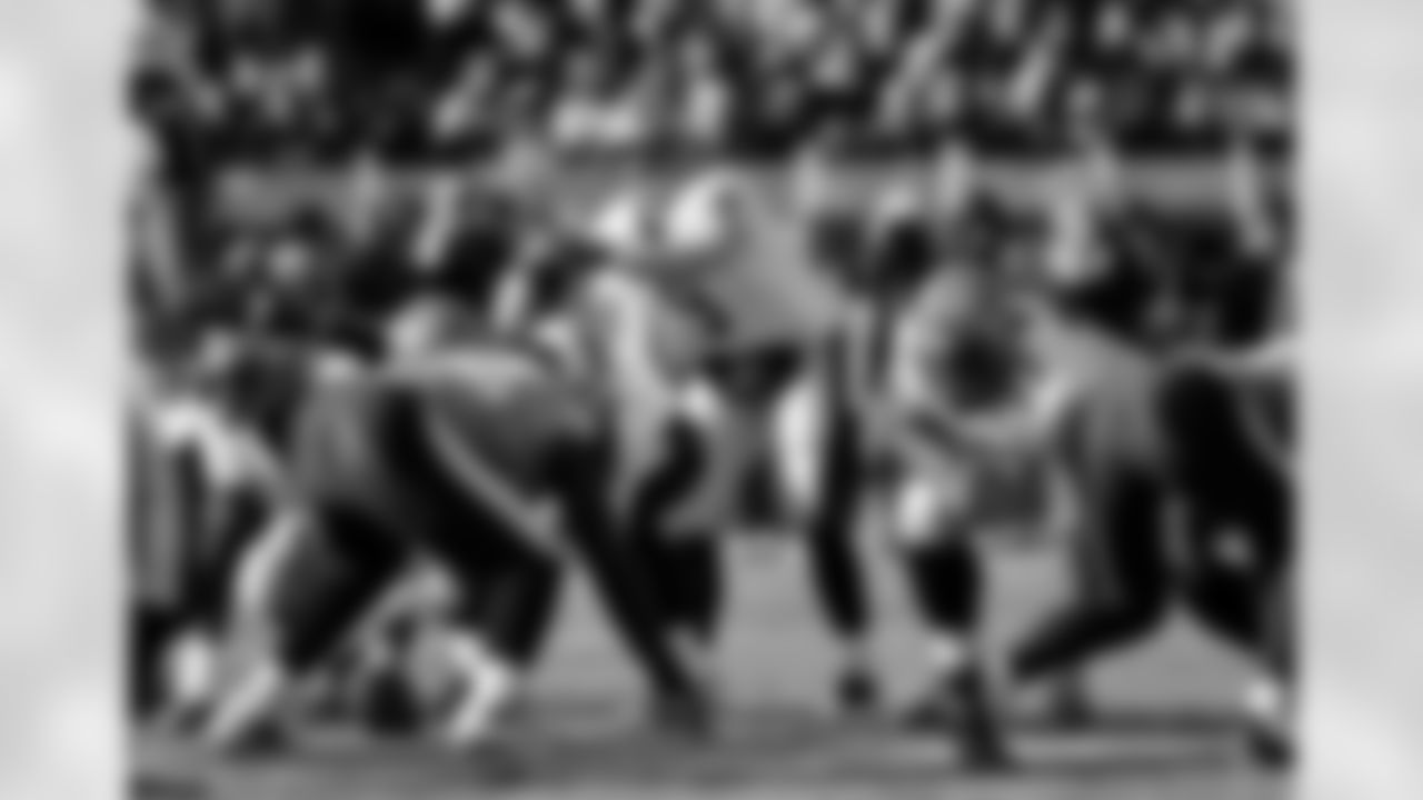 New Orleans Saints quarterback Drew Brees (9) calls a play in the first quarter of an NFL football game against the Tennessee Titans on Sunday, Dec. 11, 2011, in Nashville, Tenn. (AP Photo/Frederick Breedon)