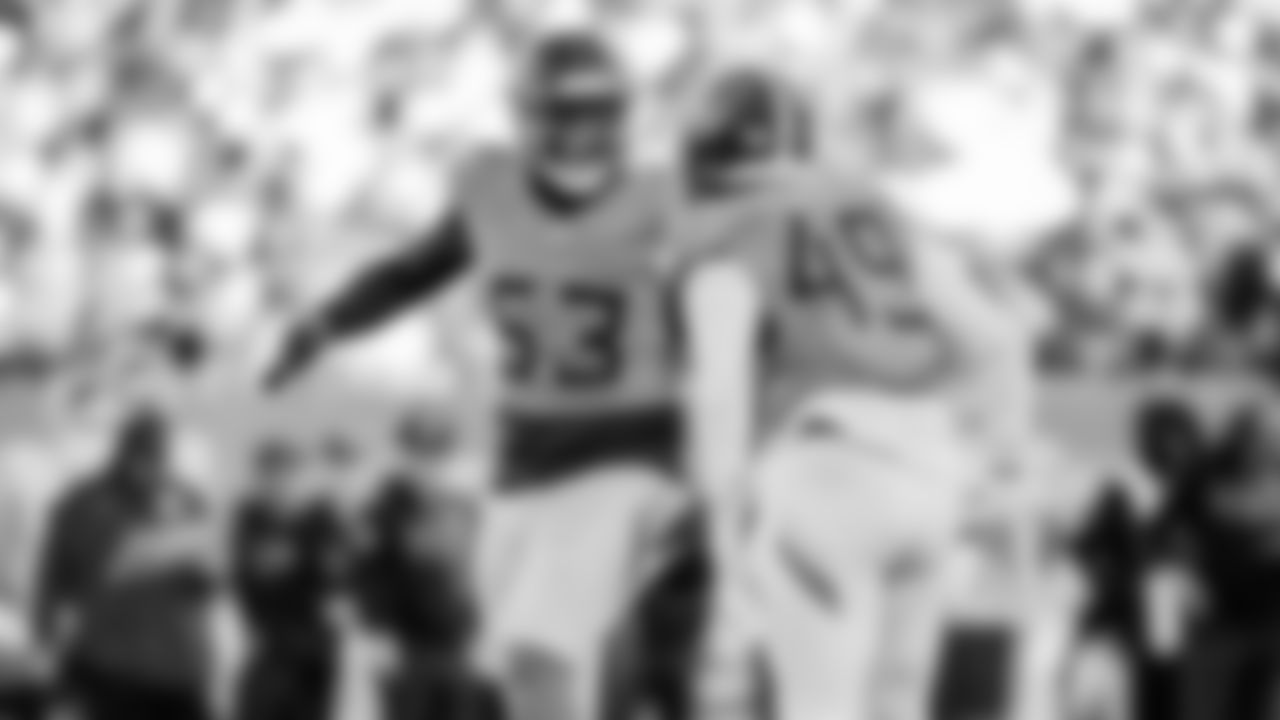 Outside linebacker Jihad Ward #53 of the Tennessee Titans, Outside linebacker Arden Key #49 of the Tennessee Titans during the game between the Tennessee Titans and the Kansas City Chiefs at Nissan Stadium on December 21, 2025 in Nashville, TN. Photo By Beau Brune/Tennessee Titans