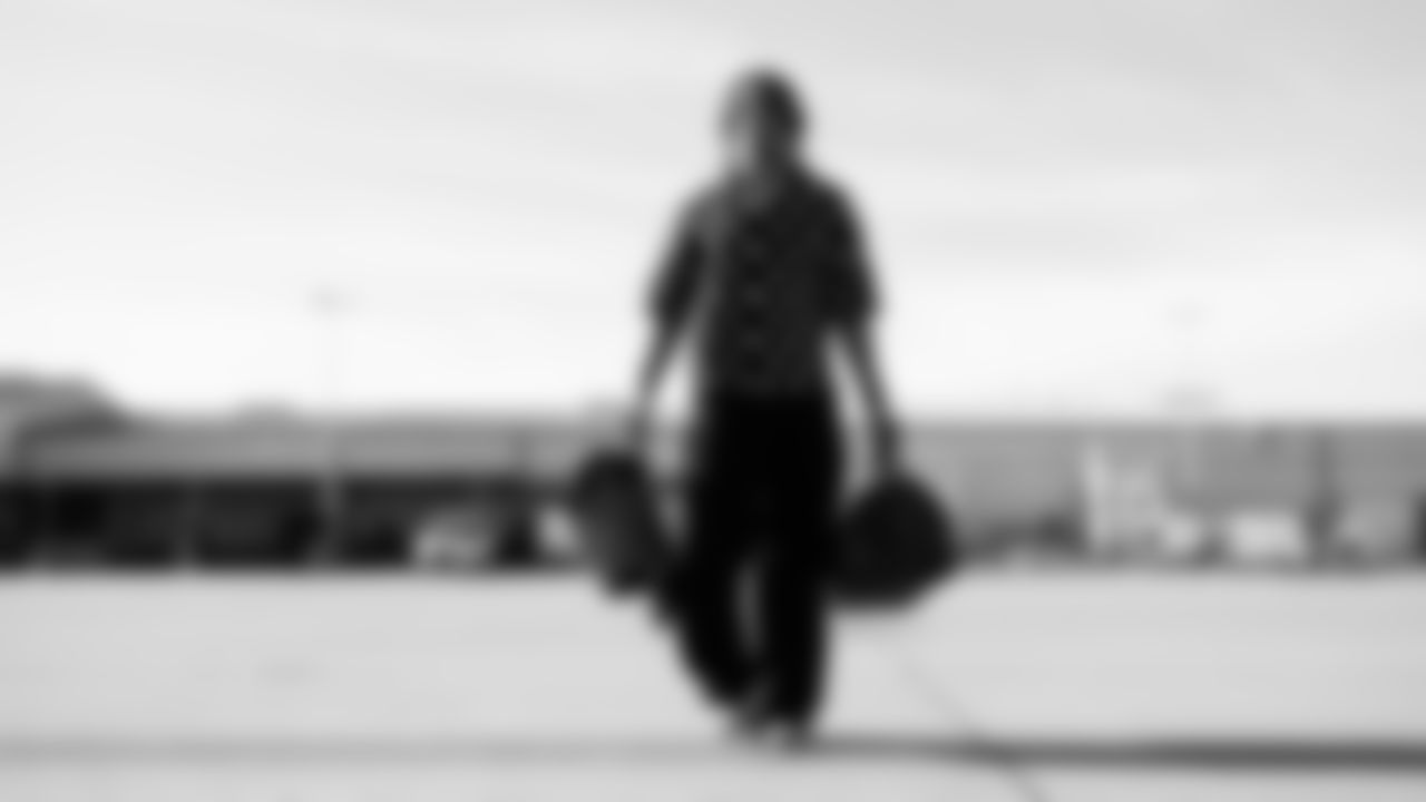 Cornerback Micah Robinson #21 of the Tennessee Titans during the travel day at the Nashville International Airport on December 13, 2025 in Nashville, TN. Photo by Donald Page/Tennessee Titans