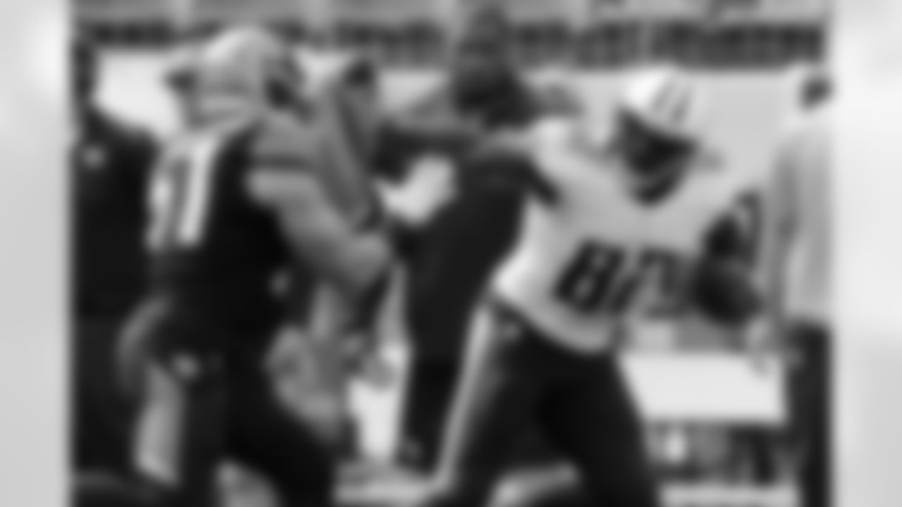 Tennessee Titans tight end Delanie Walker (82) tries to get past Jacksonville Jaguars middle linebacker Paul Posluszny (51) in the first quarter of an NFL football game Sunday, Oct. 12, 2014, in Nashville, Tenn. (AP Photo/Mark Zaleski)