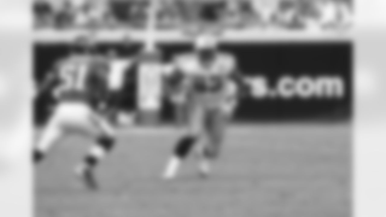 Tennessee Titans tight end Alge Crumpler, right, and Jacksonville Jaguars linebacker Clint Ingram during an NFL football game, Sunday, Oct. 4, 2009, in Jacksonville, Fla.(AP Photo/Phil Coale)