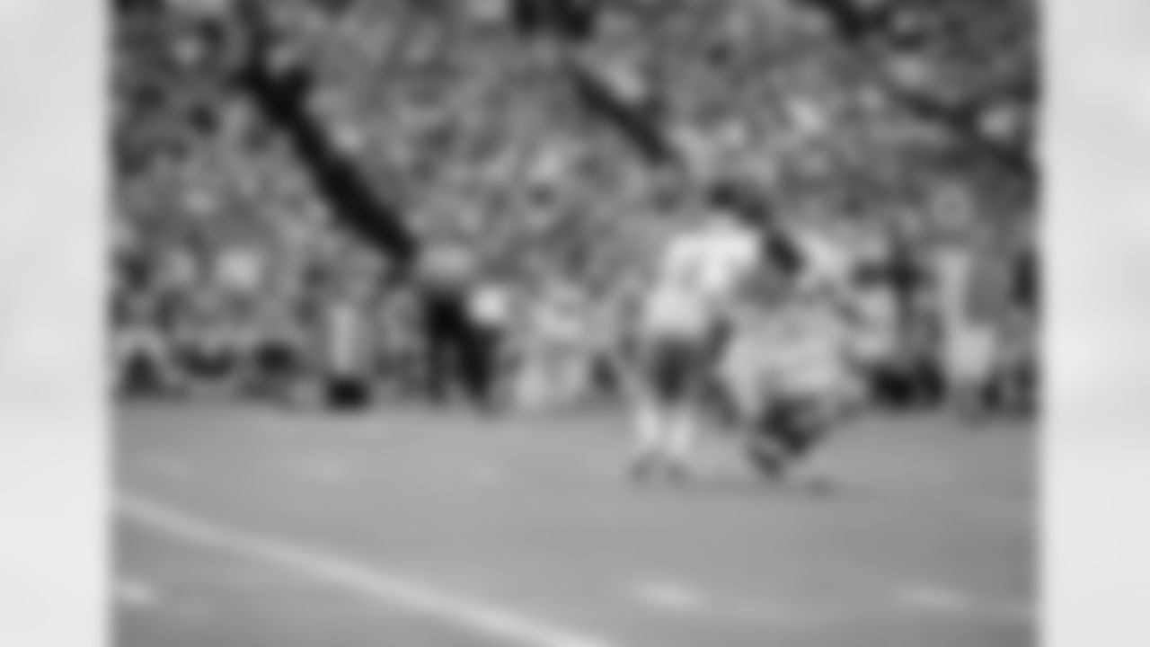 New Orleans Saints defenders DArtagnan Martin (22) and Hugo Hollas (18) shown as they doubled up to break up the first quarter pass that was intended for Houston Oilers wide receiver Charlie Joiner (18) in the first quarter at the Houston Astrodome, Sunday, Oct. 3, 1971, Houston, Tex. The game ended in a 13-13 tie. (AP Photo/Ed Kolenovsky)