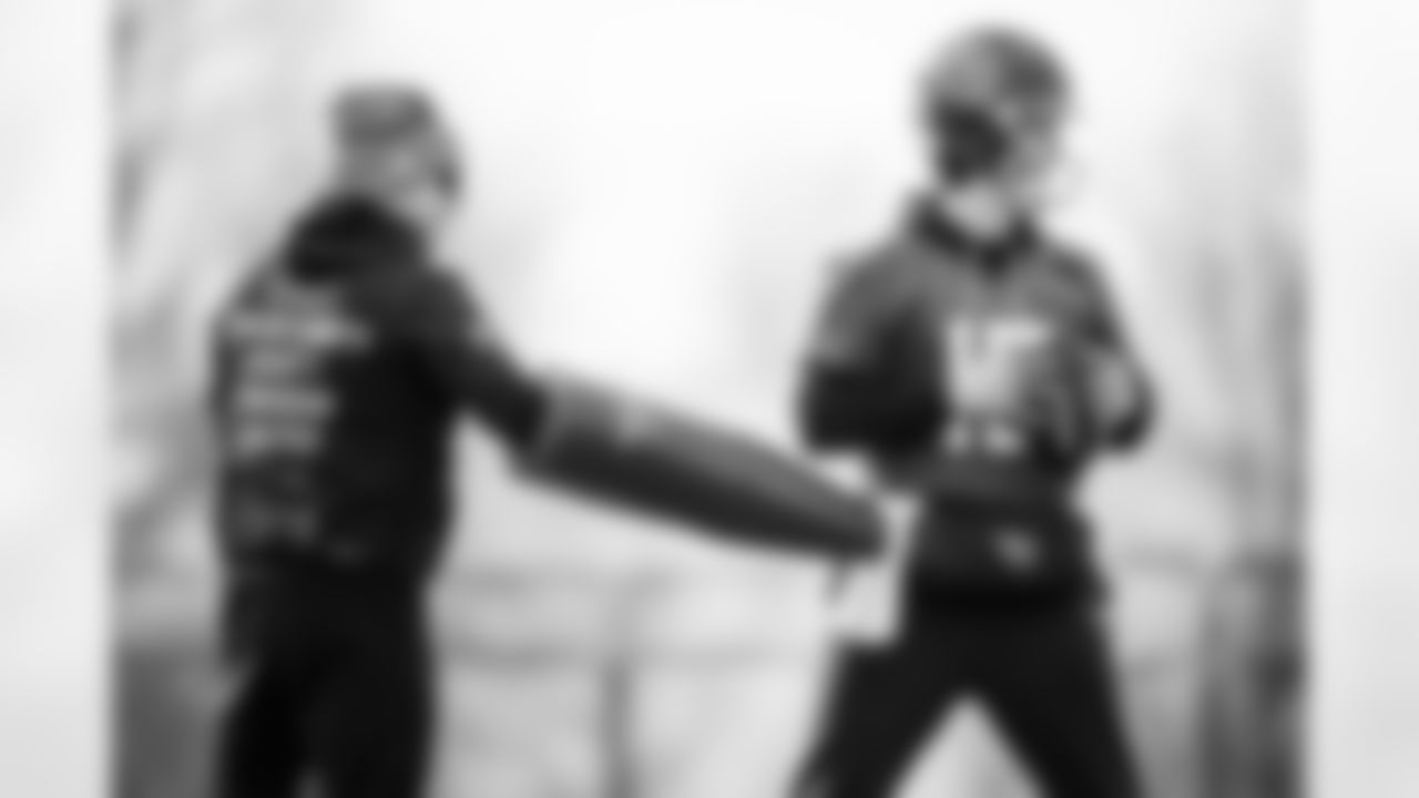 Assistant Wide Receivers Coach Payton McCollum of the Tennessee Titans and Quarterback Trevor Siemian #15 of the Tennessee Titans during practice at the Ascension Saint Thomas Sports Park on December 31, 2025 in Nashville, TN. Photo By Donald Page/Tennessee Titans