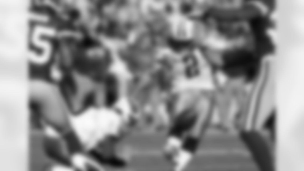 Tennessee Titans PK Rob Bironas, right, kicks a field goal as Tennessee Titans punter Brett Kern, left, holds the ball during their NFL football game against the Tennessee Titans in San Francisco, Sunday, Nov. 8, 2009. (AP Photo/Marcio Sanchez)