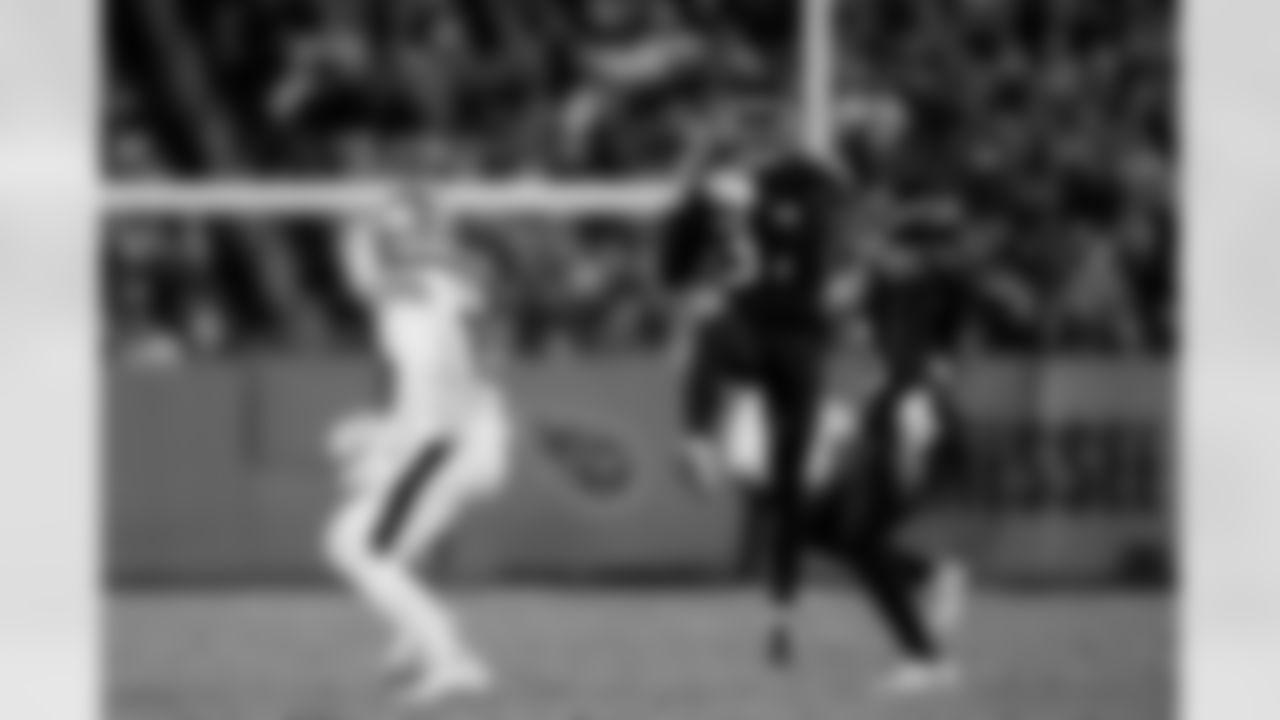 Tennessee Titans safety Amani Hooker (37) catches the football for an interception during an NFL football game against the San Francisco 49ers, Thursday, Dec. 23, 2021, in Nashville, Tenn. The Titans defeated the 49ers, 20-17. (Ryan Kang via AP)