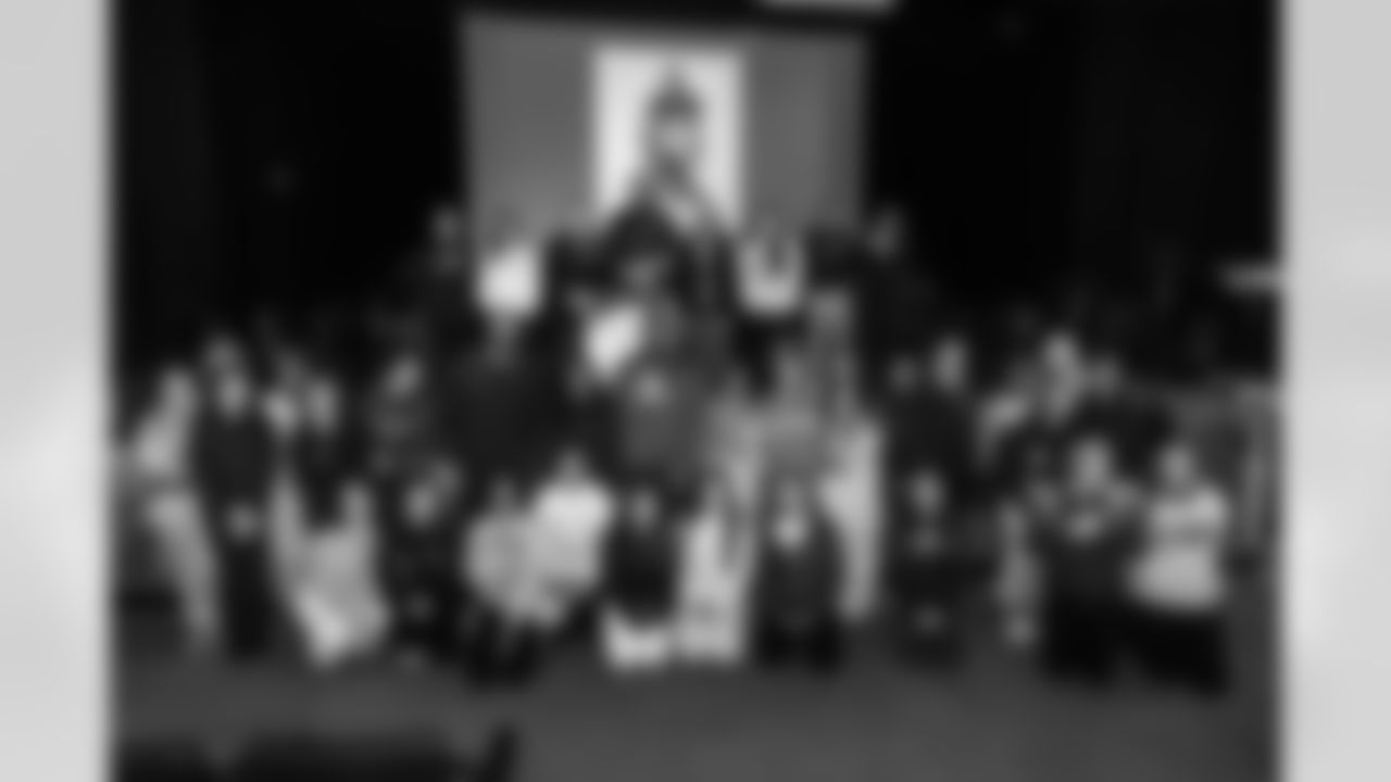 Defensive lineman Jeffery Simmons #98 of the Tennessee Titans speaks to Hunters Lane High School Girls Flag Football team after giving a donation on December 09, 2025 in Nashville, TN. Photo By Donald Page/Tennessee Titans