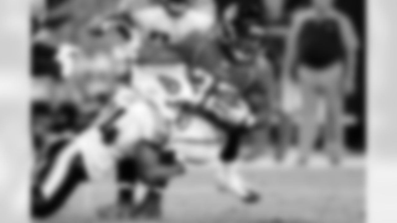 Jacksonville Jaguars running back Maurice Jones-Drew (32) runs for 11 yards before being tackled by Tennessee Titans safety Chris Hope (24) in the fourth quarter during a NFL week 6 football game on Monday October 18, 2010 in Jacksonville, Florida.  The Titans won the game 30-3.  (AP Photo/Jim Mahoney)