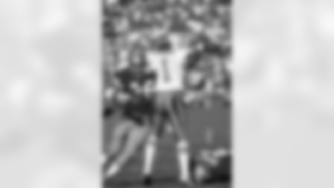 San Francisco 49ers defensive lineman Dwaine Board (76) pass rushes during an NFL game against Houston Oilers quarterback Warren Moon (1) on Sunday, Nov. 8, 1987, in San Francisco. The 49ers won the game, 27-20. (AP Photo/Greg Trott)