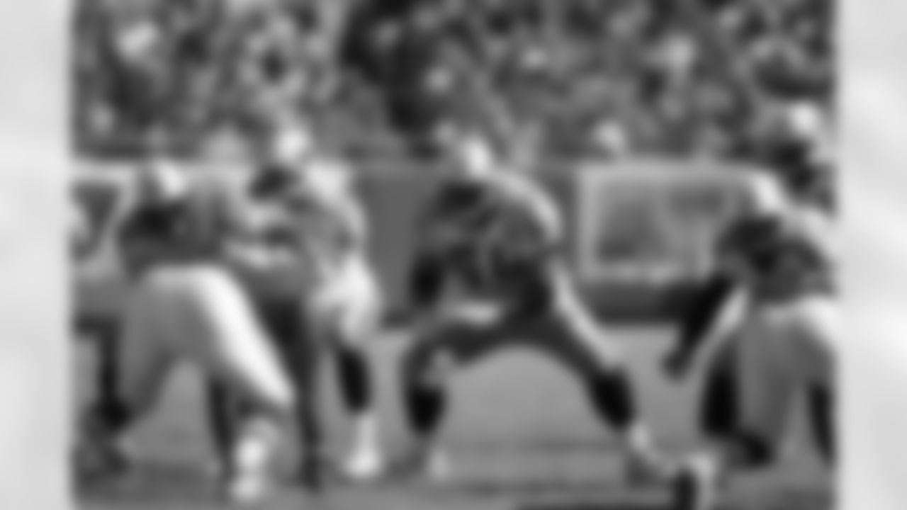 Guard Eugene Amano #54 of the Tennessee Titans blocks during the game against the Kansas City Chiefs at Arrowhead Stadium on October 19, 2008 in Kansas City, Missouri. The Titans defeated the Chiefs 34-10. (AP Photo/Paul Spinelli)