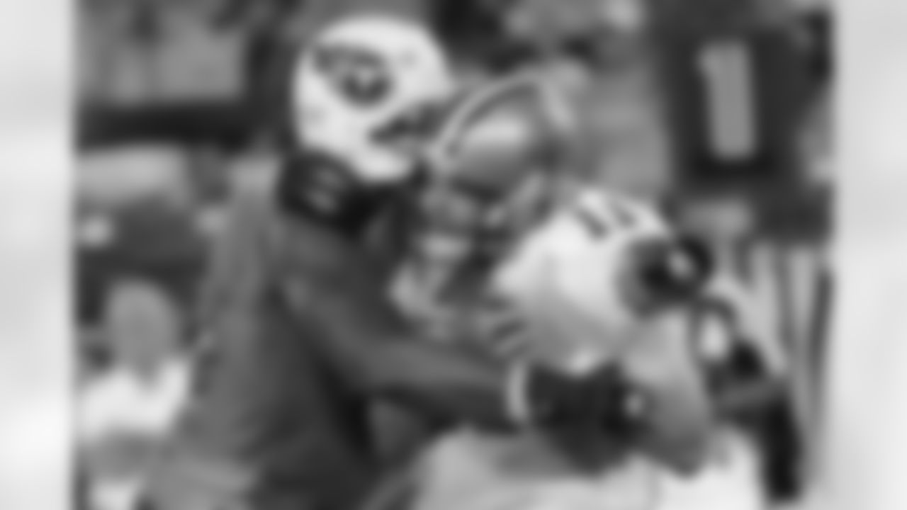 Tennessee Titans defender Jason Jones, left, sacks New Orleans Saints quarterback Patrick Ramsey (11) during the first half their NFL preseason football game at LP Field in Nashville, Tenn., Thursday, Sept. 2, 2010. (AP Photo/John Russell)