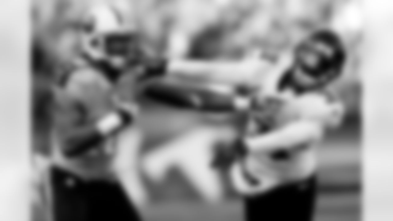 Tennessee Titans wide receiver Kenny Britt (18) pushes Jacksonville Jaguars cornerback Aaron Ross (31) away as Britt makes a catch in the third quarter of an NFL football game, Sunday, Dec. 30, 2012, in Nashville, Tenn. (AP Photo/Wade Payne)