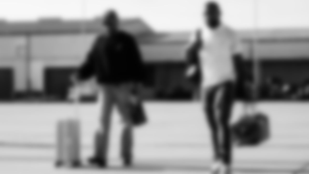 Wide receiver Bryce Oliver #80 of the Tennessee Titans and Running back Tony Pollard #20 of the Tennessee Titans during the travel day at the Nashville International Airport on January 03, 2026 in Nashville, TN. Photo by Jessie Rogers/Tennessee Titans