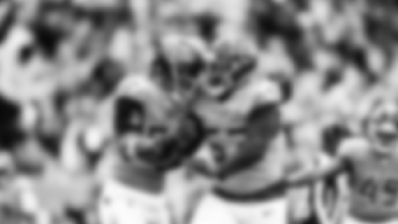 Outside linebacker Jaylen Harrell #92 of the Tennessee Titans and Outside linebacker Jihad Ward #53 of the Tennessee Titans during the game between the Tennessee Titans and the Los Angeles Chargers at Nissan Stadium on November 02, 2025 in Nashville, TN. Photo By Camden Hall/Tennessee Titans