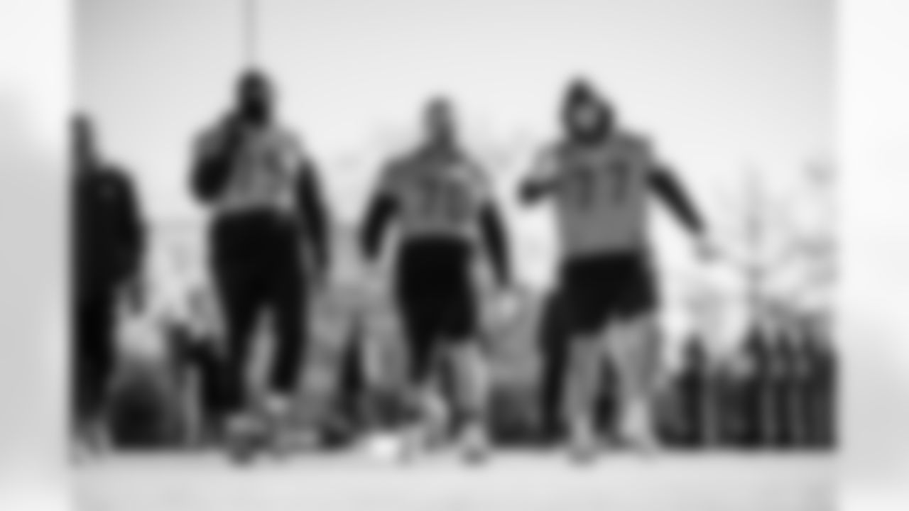 Tackle Dan Moore Jr. #75 of the Tennessee Titans, Guard Kevin Zeitler #70 of the Tennessee Titans and Offensive lineman Peter Skoronski #77 of the Tennessee Titans during practice at the Ascension Saint Thomas Sports Park on December 19, 2025 in Nashville, TN. Photo By Jessie Rogers/Tennessee Titans