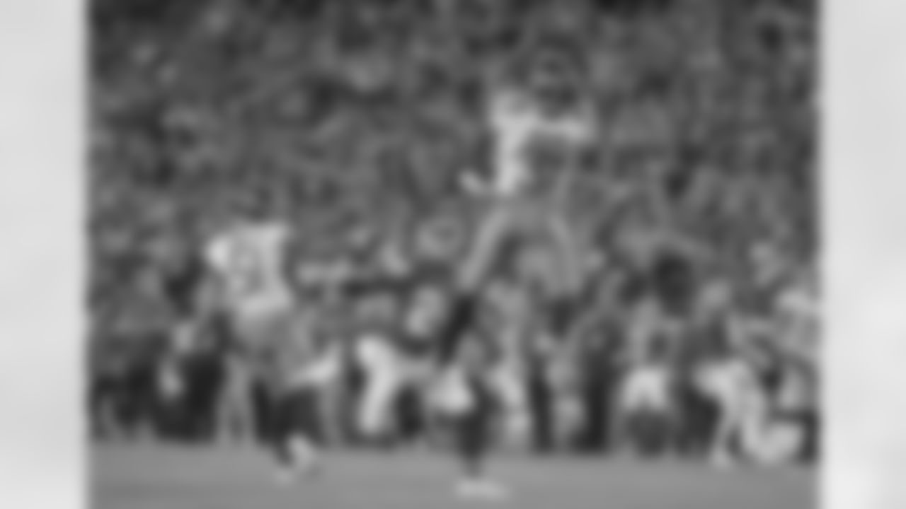 Tennessee Titans safety Kevin Byard (31) intercepts a pass over Kansas City Chiefs wide receiver Skyy Moore (24) during an NFL football game Sunday, Nov. 6, 2022, in Kansas City, Mo. (AP Photo/Peter Aiken)