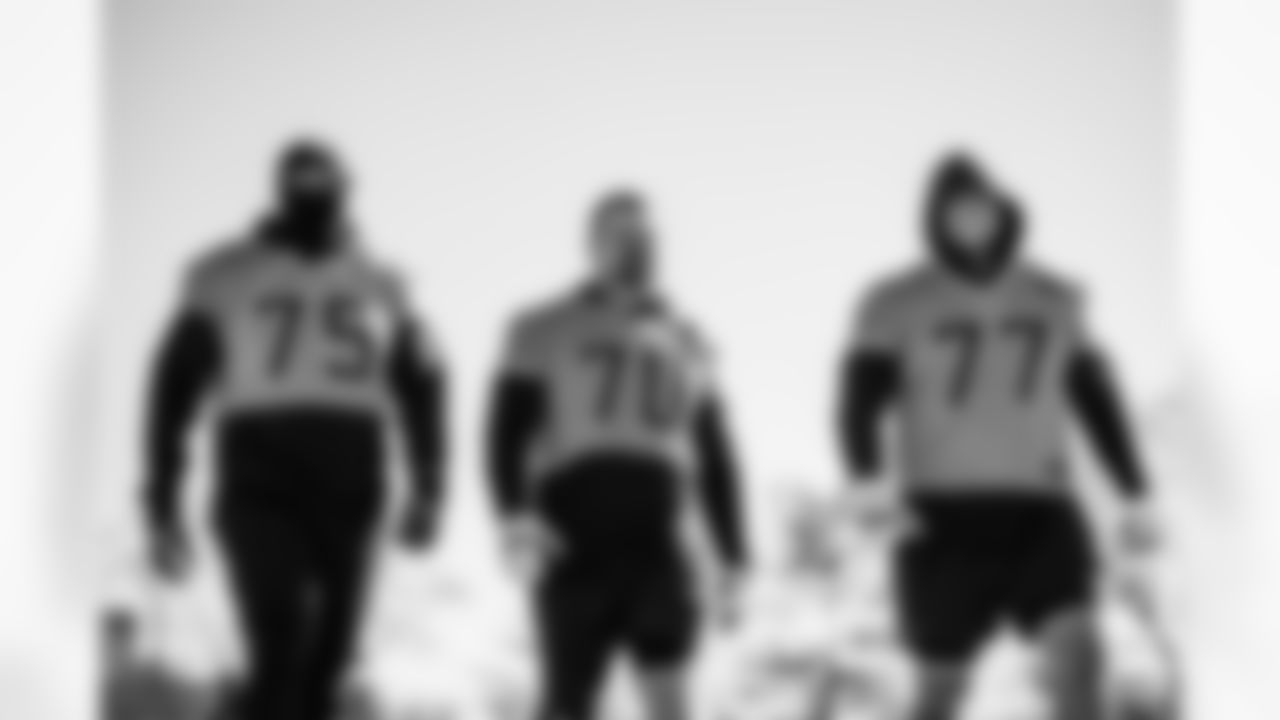 Tackle Dan Moore Jr. #75 of the Tennessee Titans, Guard Kevin Zeitler #70 of the Tennessee Titans and Offensive lineman Peter Skoronski #77 of the Tennessee Titans during practice at the Ascension Saint Thomas Sports Park on December 19, 2025 in Nashville, TN. Photo By Jessie Rogers/Tennessee Titans