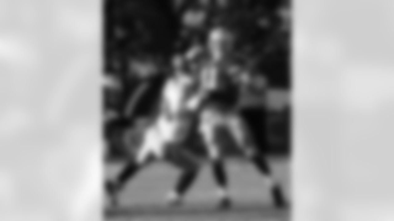 Tennessee Titans defensive end Jacob Ford (78) gets a hold of San Francisco 49ers quarterback Alex Smith (11) and forces a fumble during an NFL game against the San Francisco 49ers on November 8, 2009. The Titans defeated the 49ers 34-27. (AP Photo/Kevin Terrell)