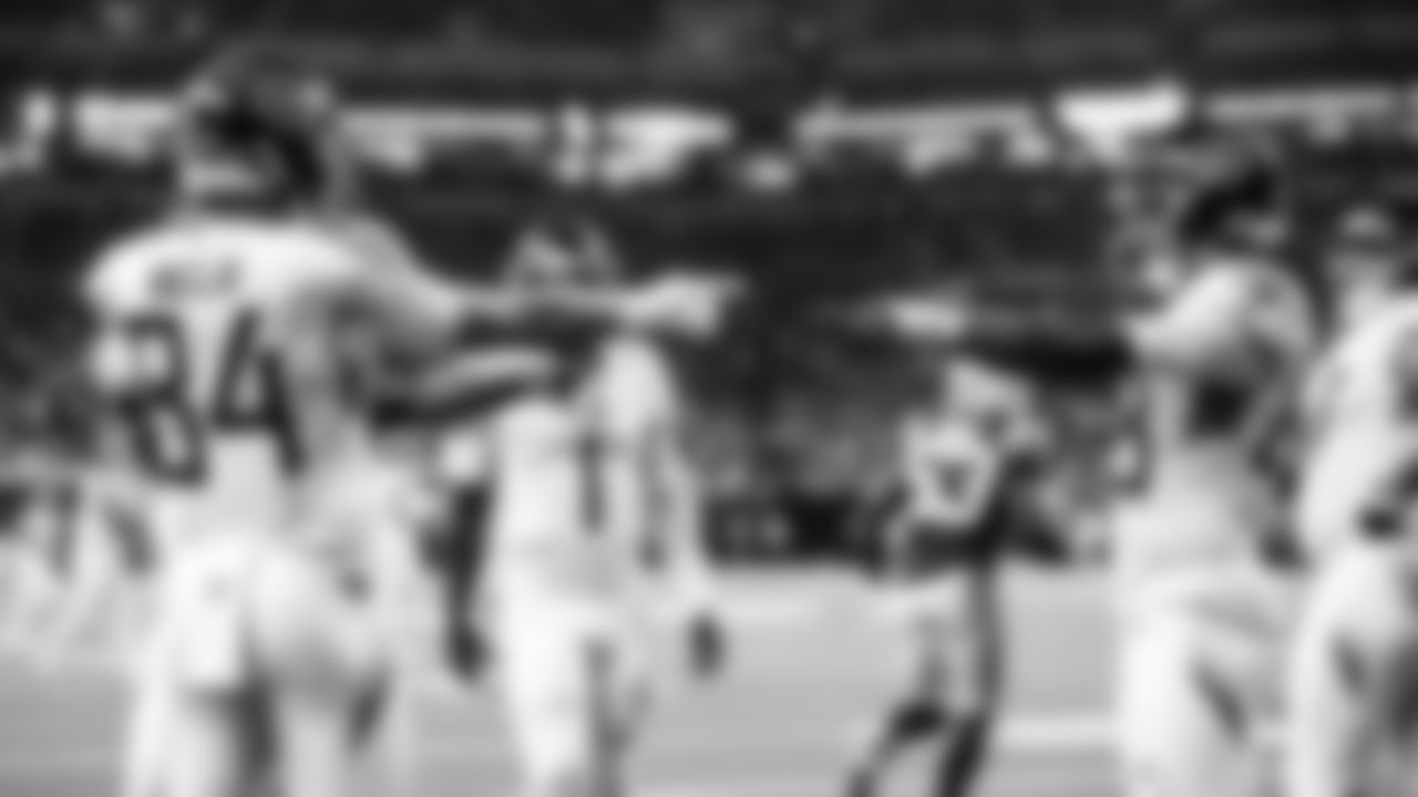 Tight end Gunnar Helm #84 of the Tennessee Titans, Tight end David Martin-Robinson #88 of the Tennessee Titans during the game between the Tennessee Titans and the Indianapolis Colts at Lucas Oil Stadium on October 26, 2025 in Indianapolis, IN. Photo By Donald Page/Tennessee Titans