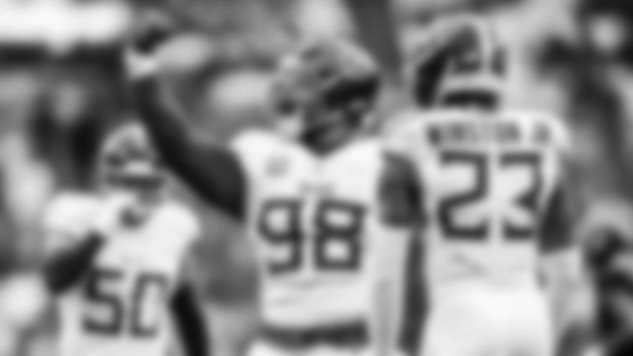 Safety Kevin Winston Jr. #23 of the Tennessee Titans and Defensive tackle Jeffery Simmons #98 of the Tennessee Titans during the game between the Tennessee Titans and the Cleveland Browns at Huntington Bank Field on December 07, 2025 in Cleveland, OH. Photo By Jessie Rogers/Tennessee Titans