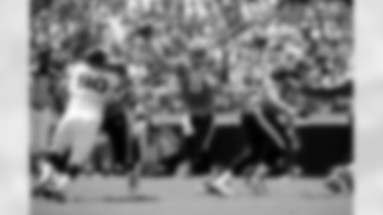 Tennessee Titans quarterback Matt Hasselbeck (8) attempts a pass during the first half of an NFL football game against the Jacksonville Jaguars  in Jacksonville, Florida, Sunday, Sept. 11, 2011. Jacksonville won 16-14. (AP Photo/Paul Abell)