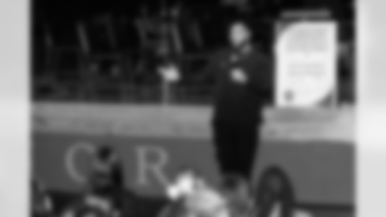 Defensive lineman Jeffery Simmons #98 of the Tennessee Titans speaks to Hunters Lane High School Girls Flag Football team after giving a donation on December 09, 2025 in Nashville, TN. Photo By Donald Page/Tennessee Titans