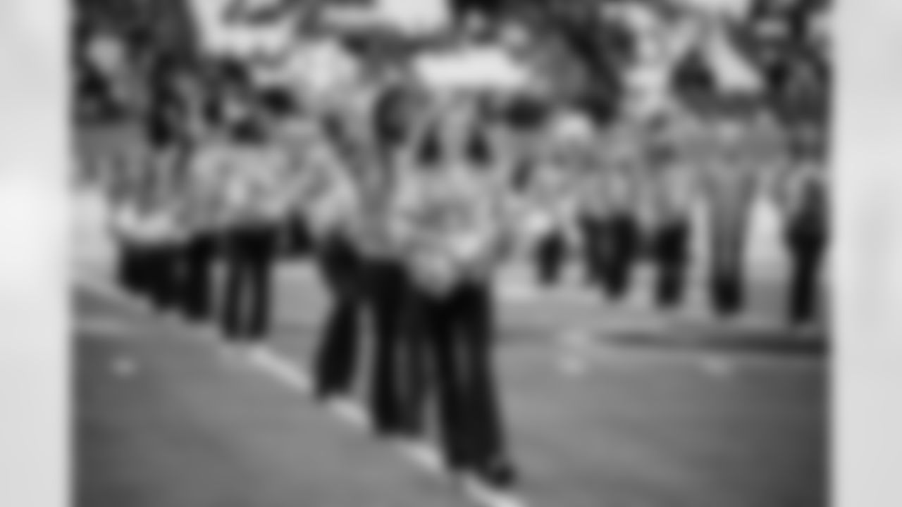 Tennessee Titans Cheerleaders performing with their Jr. Titans Cheer team on the field before the game between the Tennessee Titans and the Los Angeles Chargers at Nissan Stadium on November 02, 2025 in Nashville, TN. Photo By Kaitlyn Hungerford/Tennessee Titans