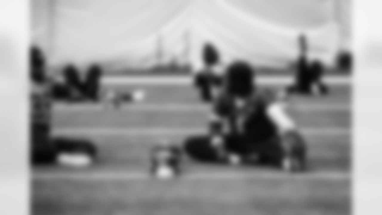 Running back Julius Chestnut #36 of the Tennessee Titans and Quarterback Cam Ward #1 of the Tennessee Titans during practice in the bubble at the Ascension Saint Thomas Sports Park on December 5, 2025 in Nashville, TN. Photo By Donald Page/Tennessee Titans