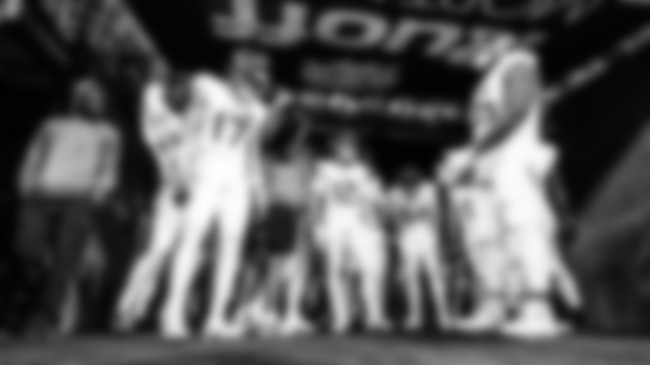 Wide receiver Chimere Dike #17 of the Tennessee Titans, Wide receiver Mason Kinsey #12 of the Tennessee Titans, Tight end Gunnar Helm #84 of the Tennessee Titans, Tackle JC Latham #55 of the Tennessee Titans before the game between the Tennessee Titans and the Indianapolis Colts at Lucas Oil Stadium on October 26, 2025 in Indianapolis, IN. Photo By Jessie Rogers/Tennessee Titans