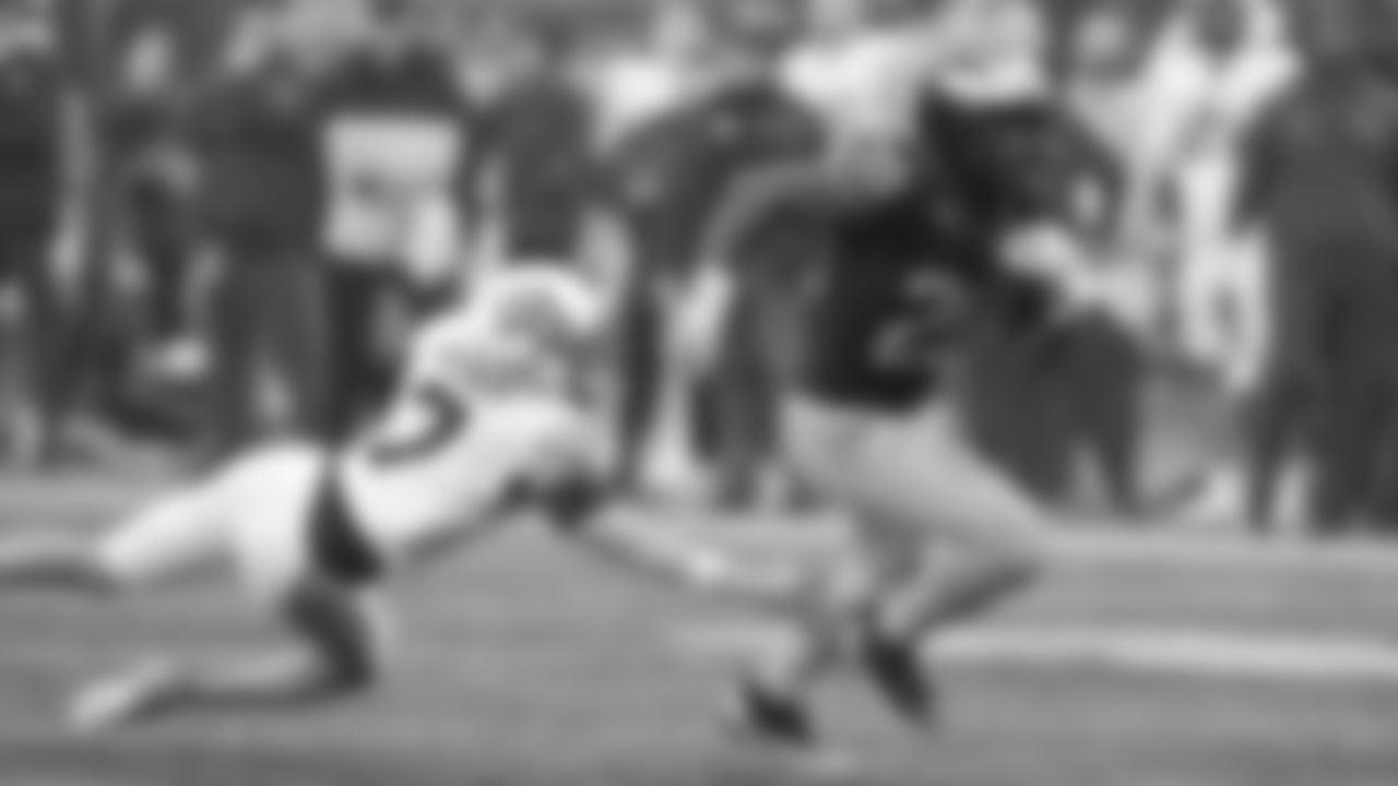 Michigan running back Kalel Mullings pulls away from Minnesota defensive back Aidan Gousby (7) during the second half of an NCAA college football game, Saturday, Sept. 28, 2024, in Ann Arbor, Mich. (AP Photo/Carlos Osorio)
