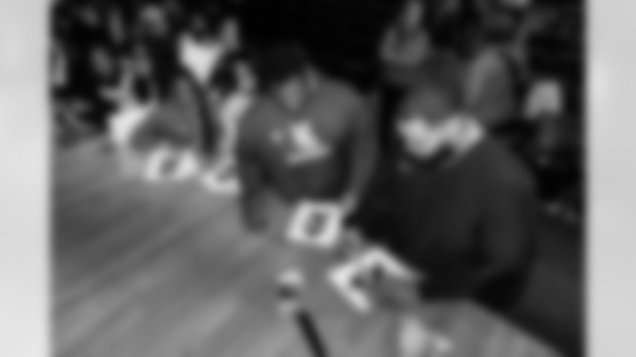 Defensive lineman Jeffery Simmons #98 of the Tennessee Titans speaks to Hunters Lane High School Girls Flag Football team after giving a donation on December 09, 2025 in Nashville, TN. Photo By Donald Page/Tennessee Titans