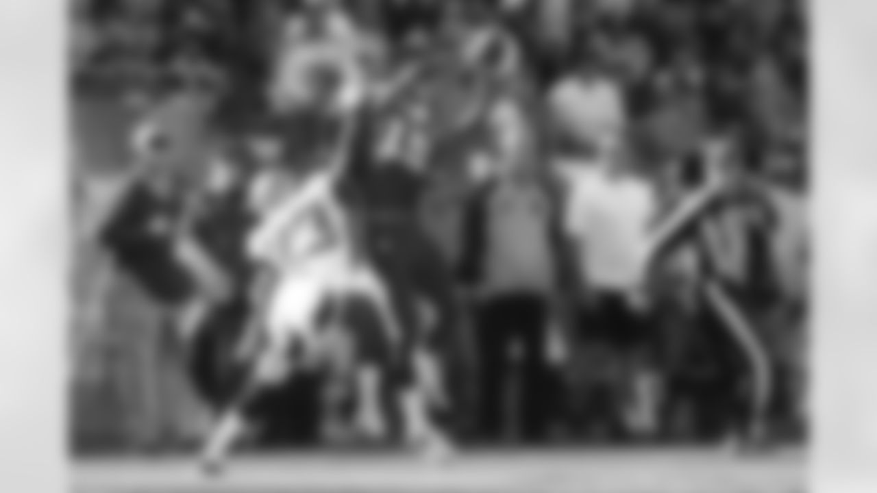 Tennessee Titans wide receiver Justin Hunter (15) catches a 40-yard pass as he is defended by Jacksonville Jaguars cornerback Alan Ball (23) in the third quarter of an NFL football game on Sunday, Nov. 10, 2013, in Nashville, Tenn. (AP Photo/Mark Zaleski)