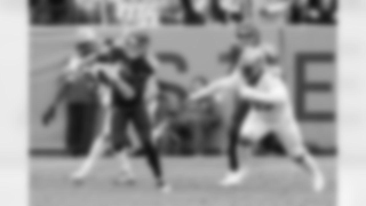 Tennessee Titans quarterback Ryan Tannehill (17) scrambles against New Orleans Saints defensive end Cameron Jordan (94) and linebacker Josh Martin (95) in the first half of an NFL football game Sunday, Dec. 22, 2019, in Nashville, Tenn. (AP Photo/Mark Zaleski)