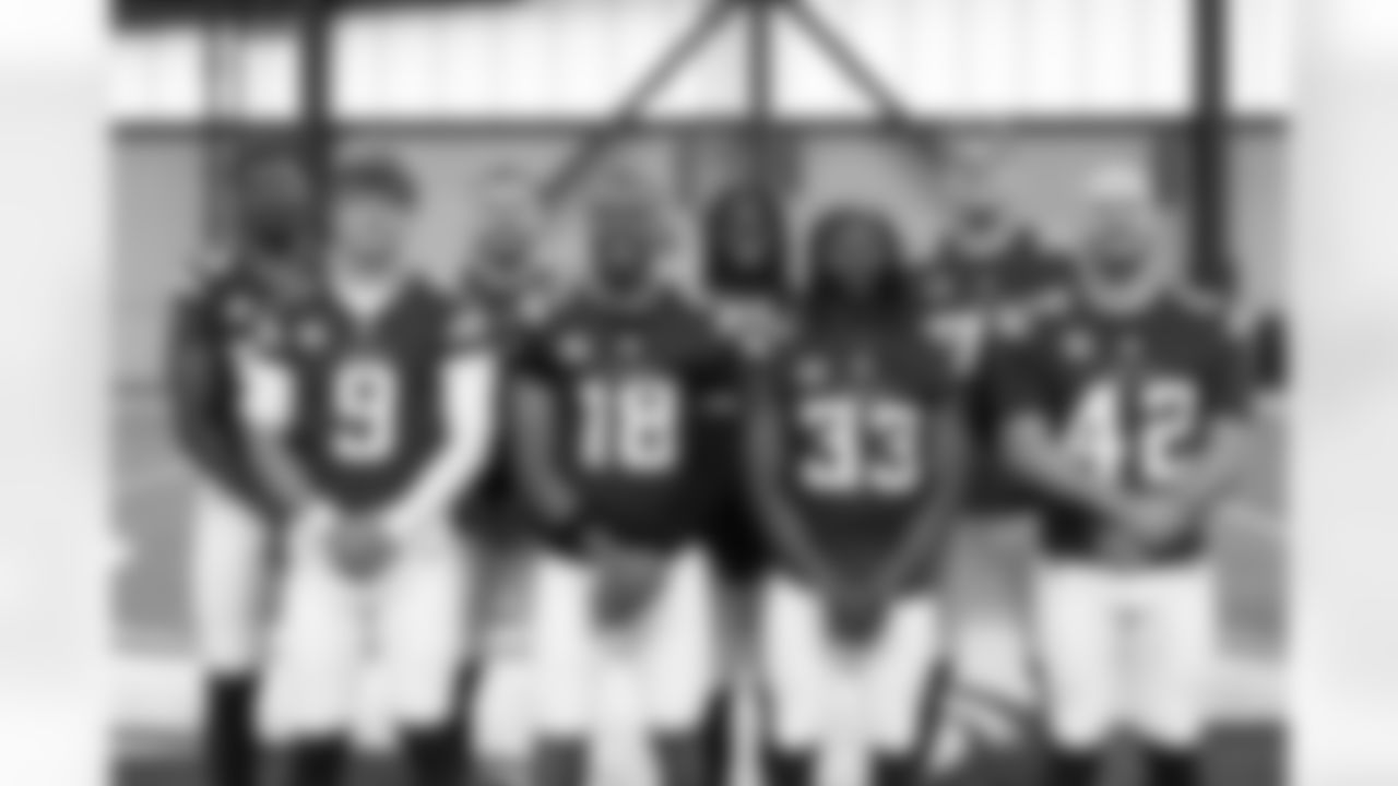 J.J. McCarthy, Justin Jefferson, Aaron Jones Sr., Andrew DePaola, Jonathan Greenard, Harrison Smith, Joshua Metellus and Brian O'Neill