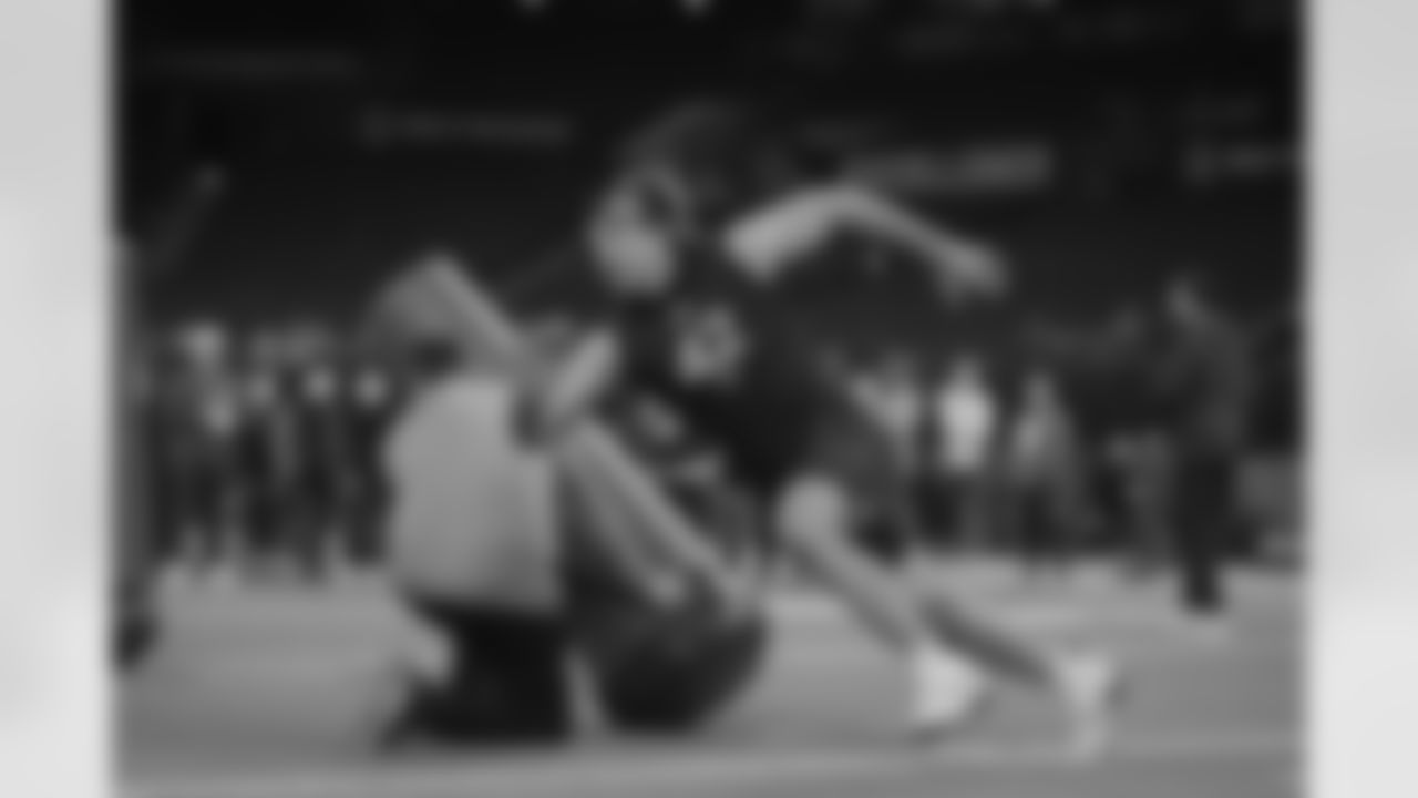 BYU defensive lineman Tyler Batty runs a drill at the NFL football scouting combine in Indianapolis, Thursday, Feb. 27, 2025. (AP Photo/Michael Conroy)