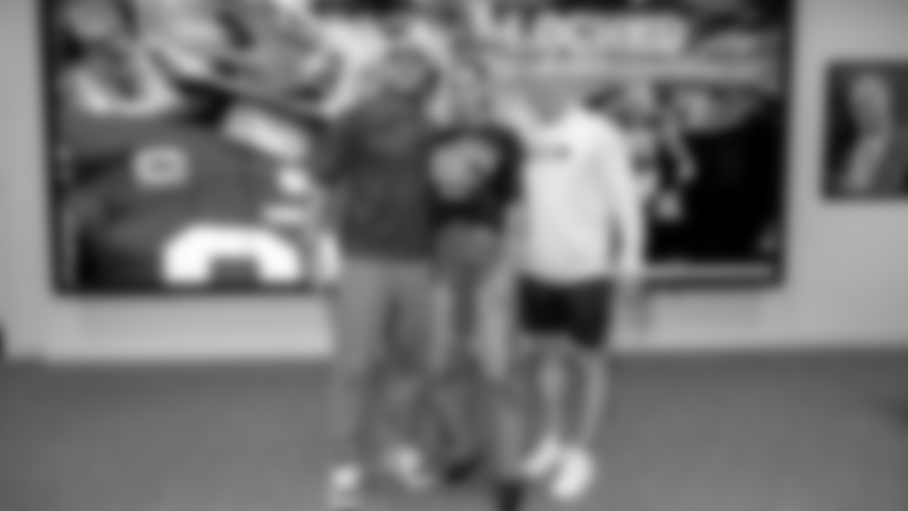 TE George Kittle, President of Football Operations/General Manager John Lynch