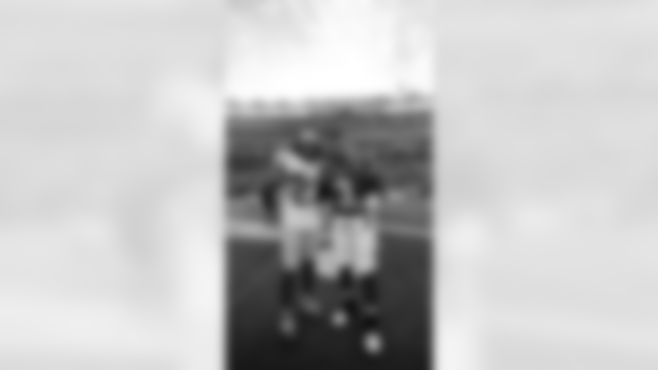 S Ji'Ayir Brown, New York Giants QB Russell Wilson