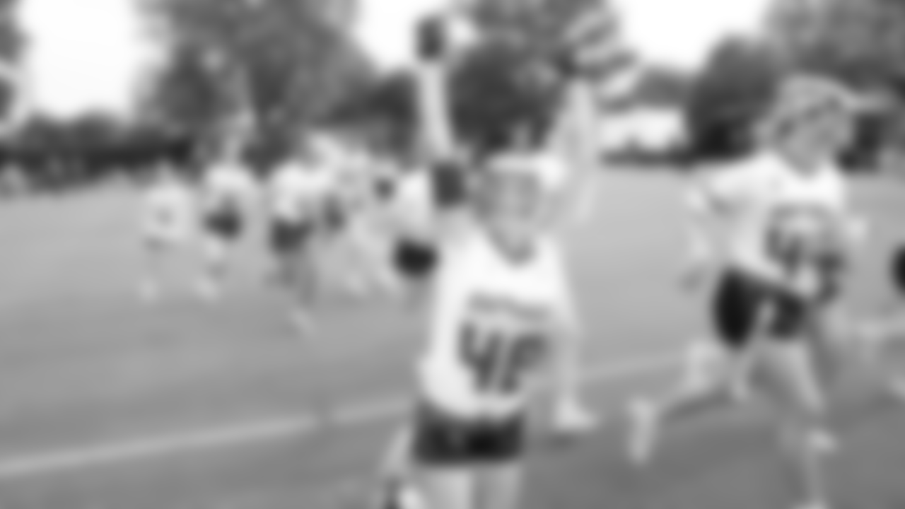 Gwynedd Mercy's Allison Maxwell runs out on the field for the Pennsylvania Championship.