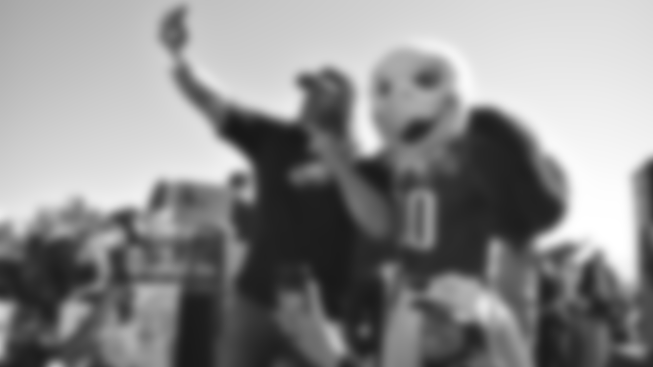 Jon Dorenbos and SWOOP get a group selfie with the Eagles fans in attendance.